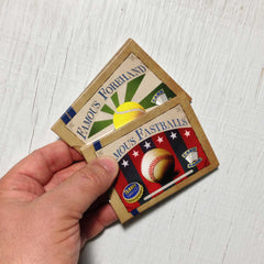 Easy card games - The Beginner Collection from Famous Games Co. - Baseball and Tennis (photo: games in hand)