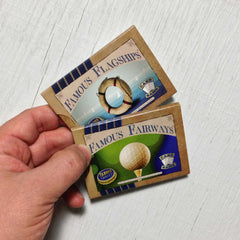 Mid-level card games - The Intermediate Collection from Famous Games Co. - Golf and Yacht Racing (photo: games in hand)