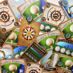 Mid-level card games - The Intermediate Collection from Famous Games Co. - Golf and Yacht Racing (photo: scattered cards)